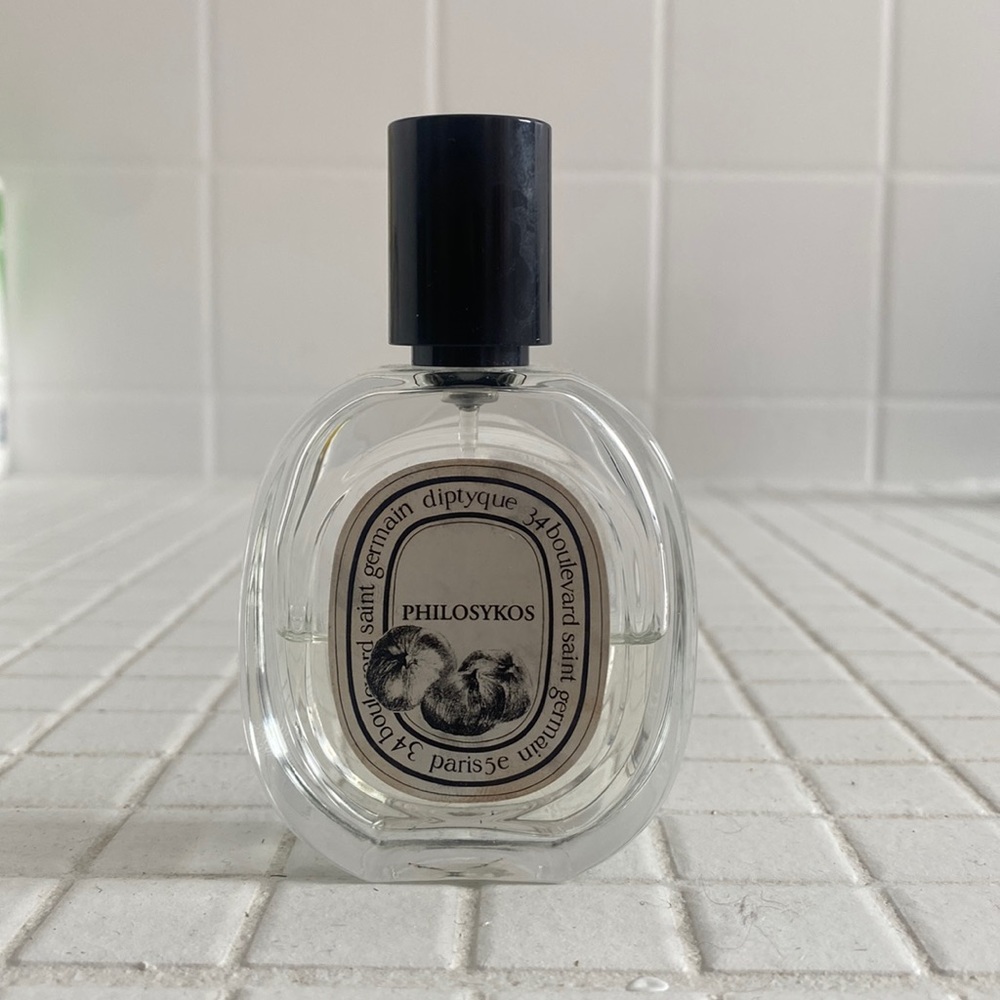 Diptyque EAU DE TOILETTE PHILOSYKOS 1oz bottle and half full
